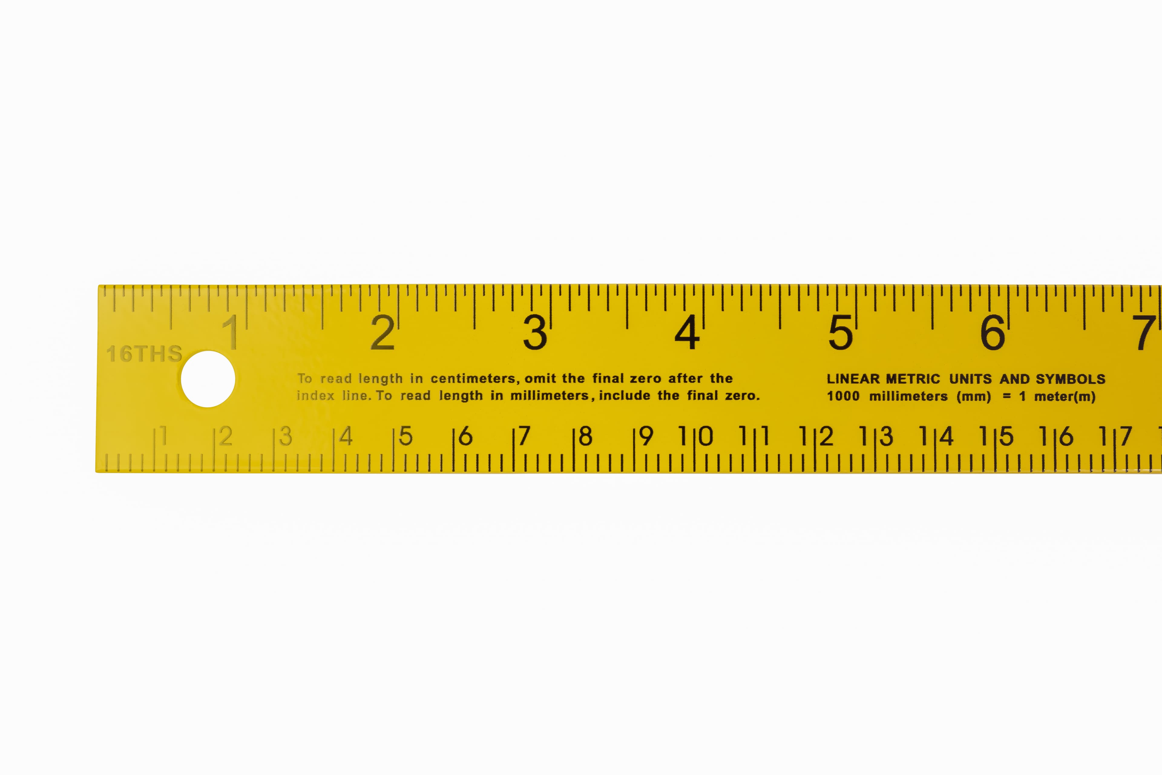 Hanging-hole end of the AE140 meterstick with the 16THS label and conversion text, showing the wide non-glare yellow powder paint finish.