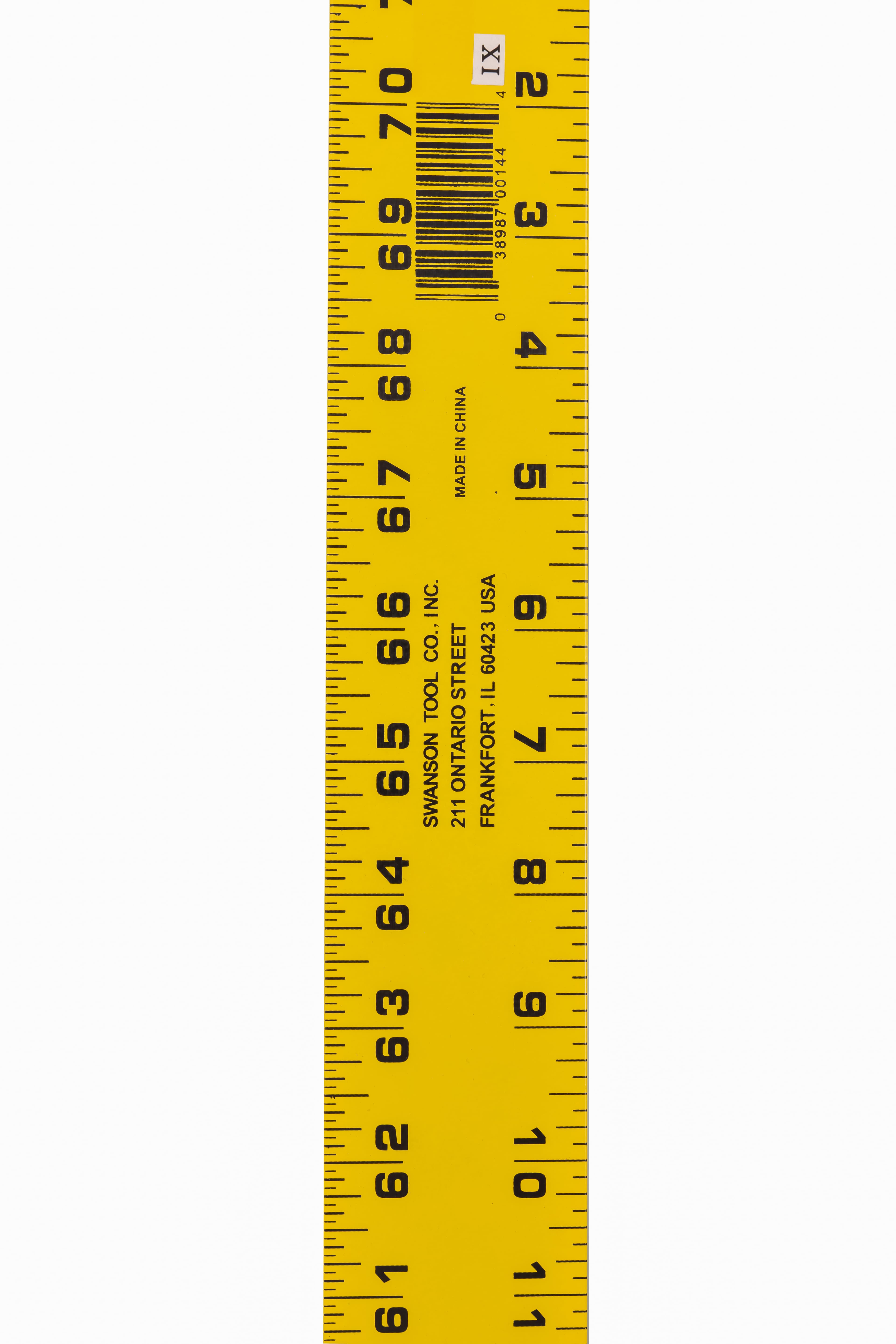 Close-up of the 70 in. end of the AE144 straight-edge showing the SWANSON TOOL CO. address and barcode on the wide yellow powder paint finish.